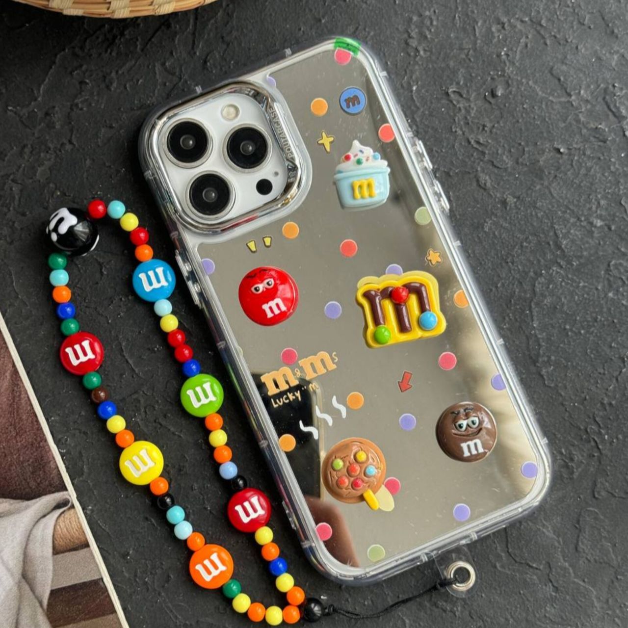 IMG_20250210_001918_825 قاب موبایل آیفون ام اند ام M&M آیینه ای بنددار - تصویر 1