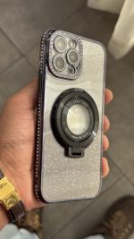 قاب موبایل ( آیفون - سامسونگ ) کلاسیک دور نگین طرح مگسیفیت استندشو - تصویر 16